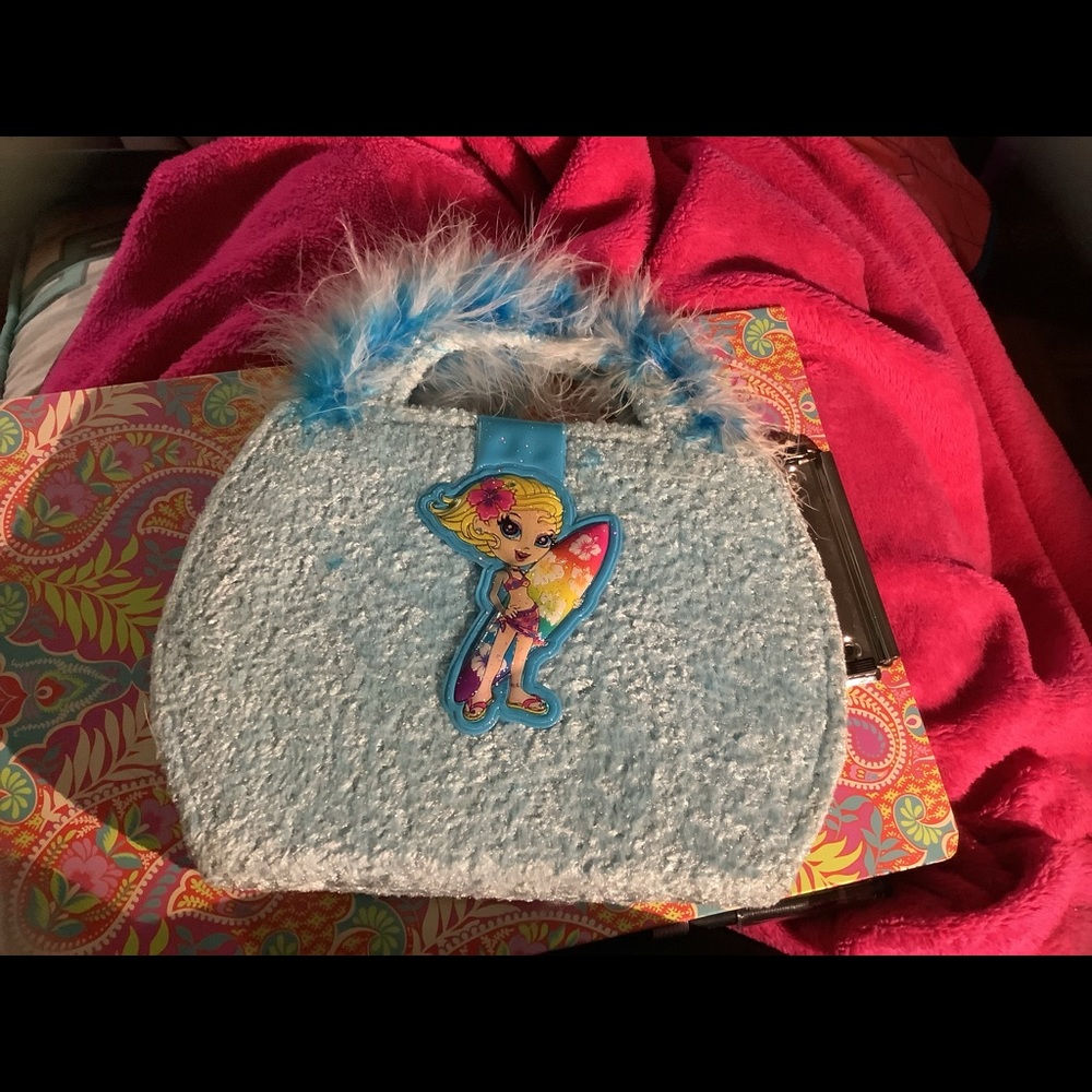 Lisa Frank Activity Binder?? I’m sure of the name